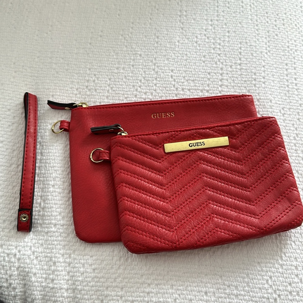 Guess wristlet set (detachable) in bright red leather. New without tags.